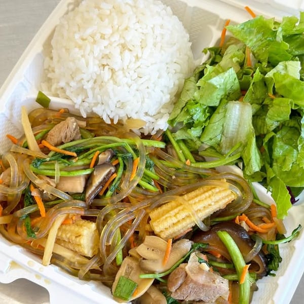 Hawaiian plate lunch with clear noodles, vegetables, meat, white rice, and a side salad.